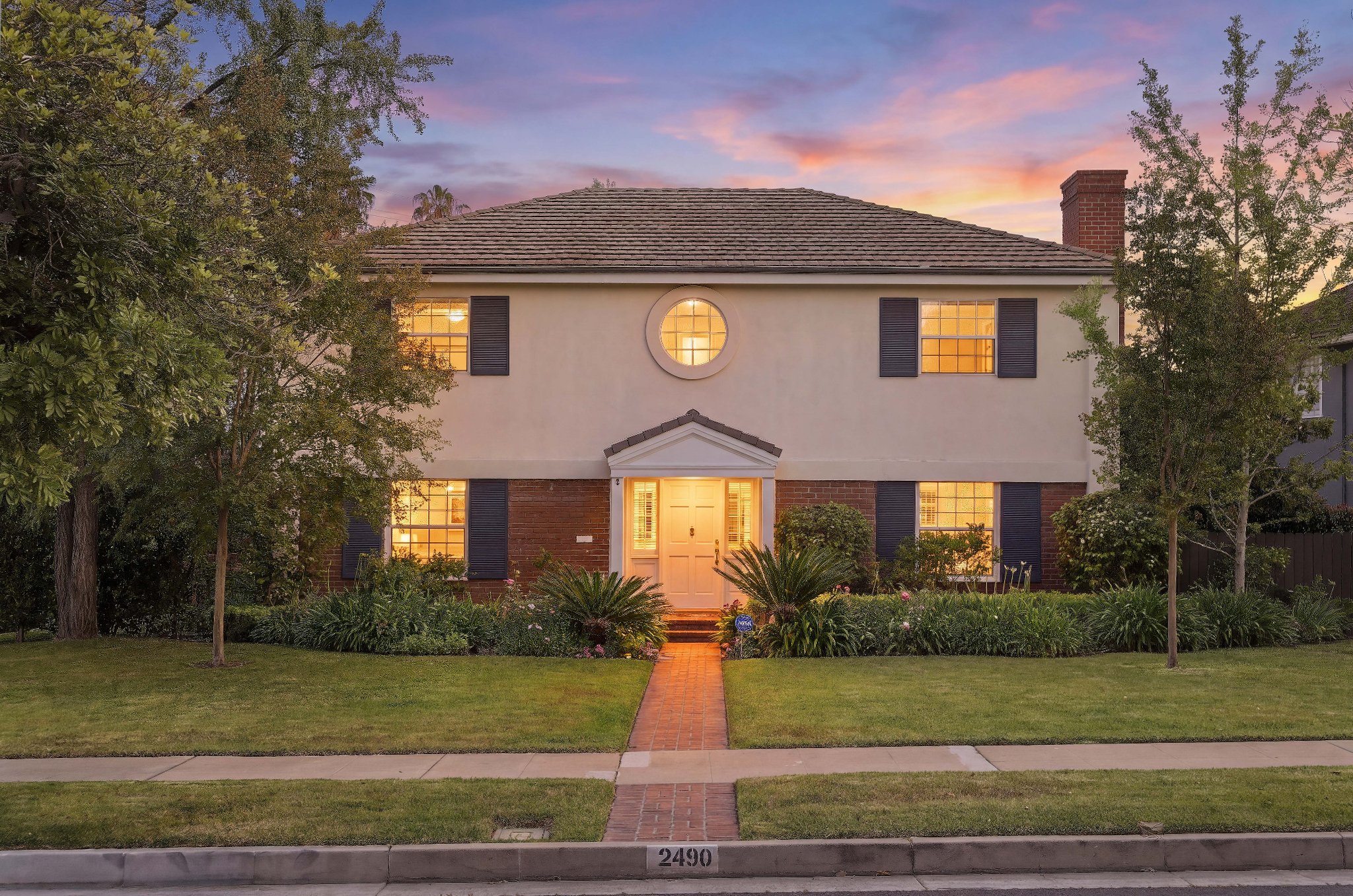 2490 Adair St exterior at sunset